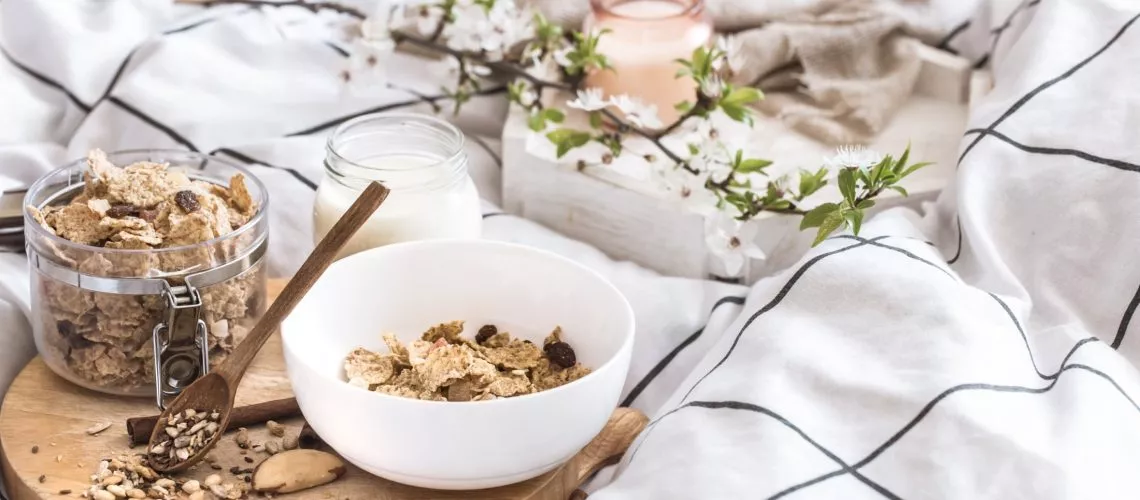 still life with a beautiful healthy Breakfast in bed , a cozy morning, healthy food.
